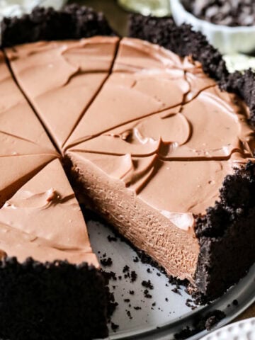 No-bake chocolate cheesecake that's been cut into slices.