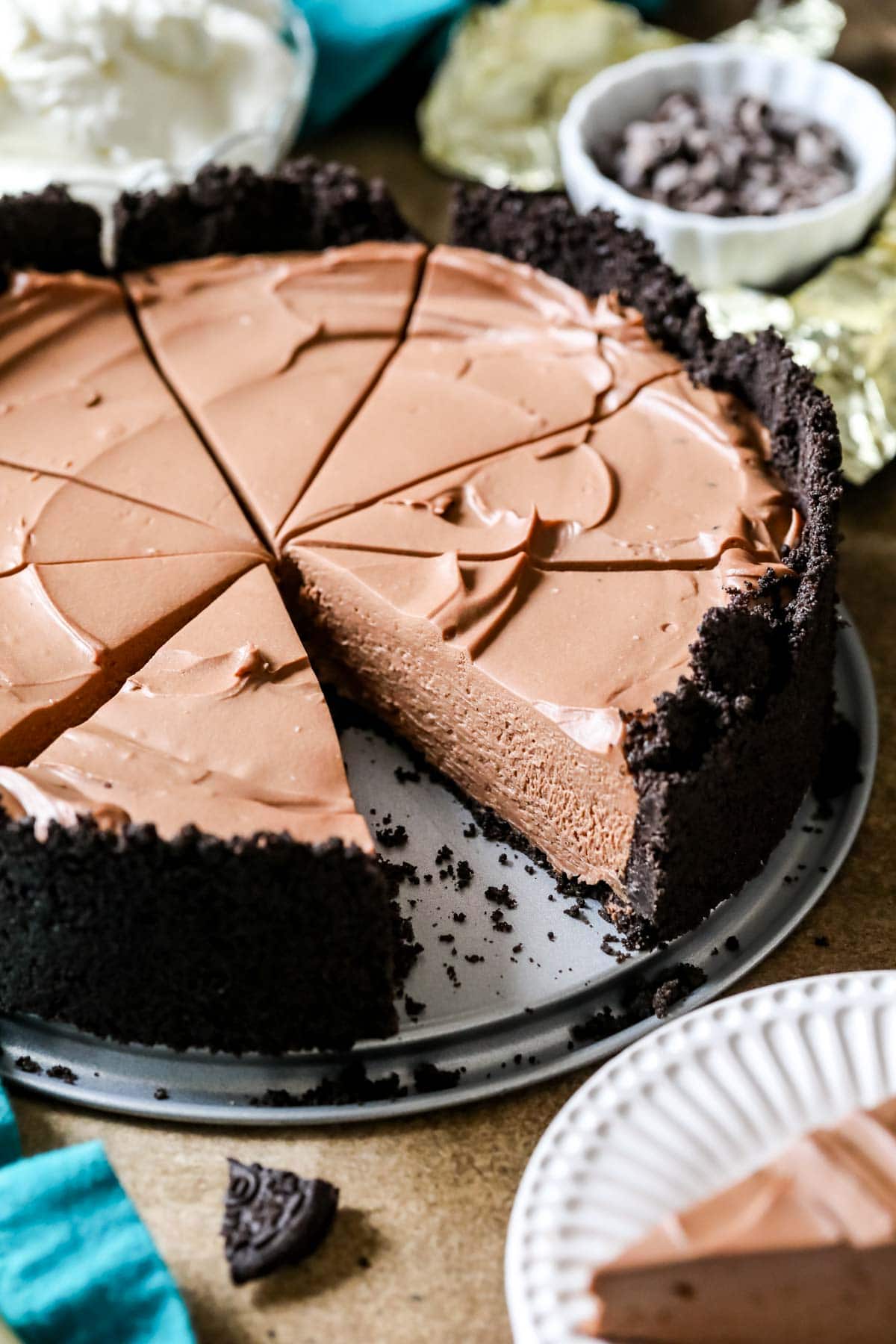 No-bake chocolate cheesecake that's been cut into slices.