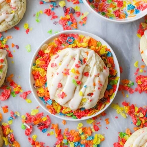 Overhead view of a Fruity Pebbles cookie sitting in a bowl of cereal.