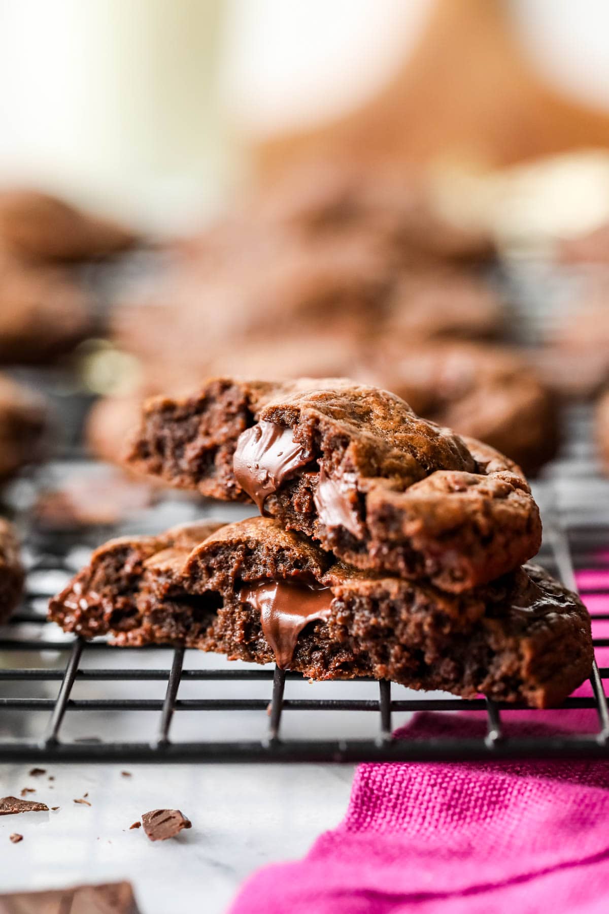 Two chocolate cookie halves stacked on top of each other.