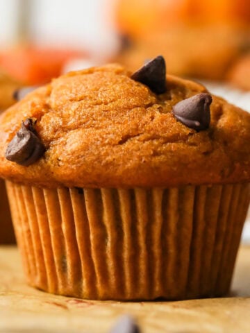 Close-up view of a pumpkin chocolate chip muffin.