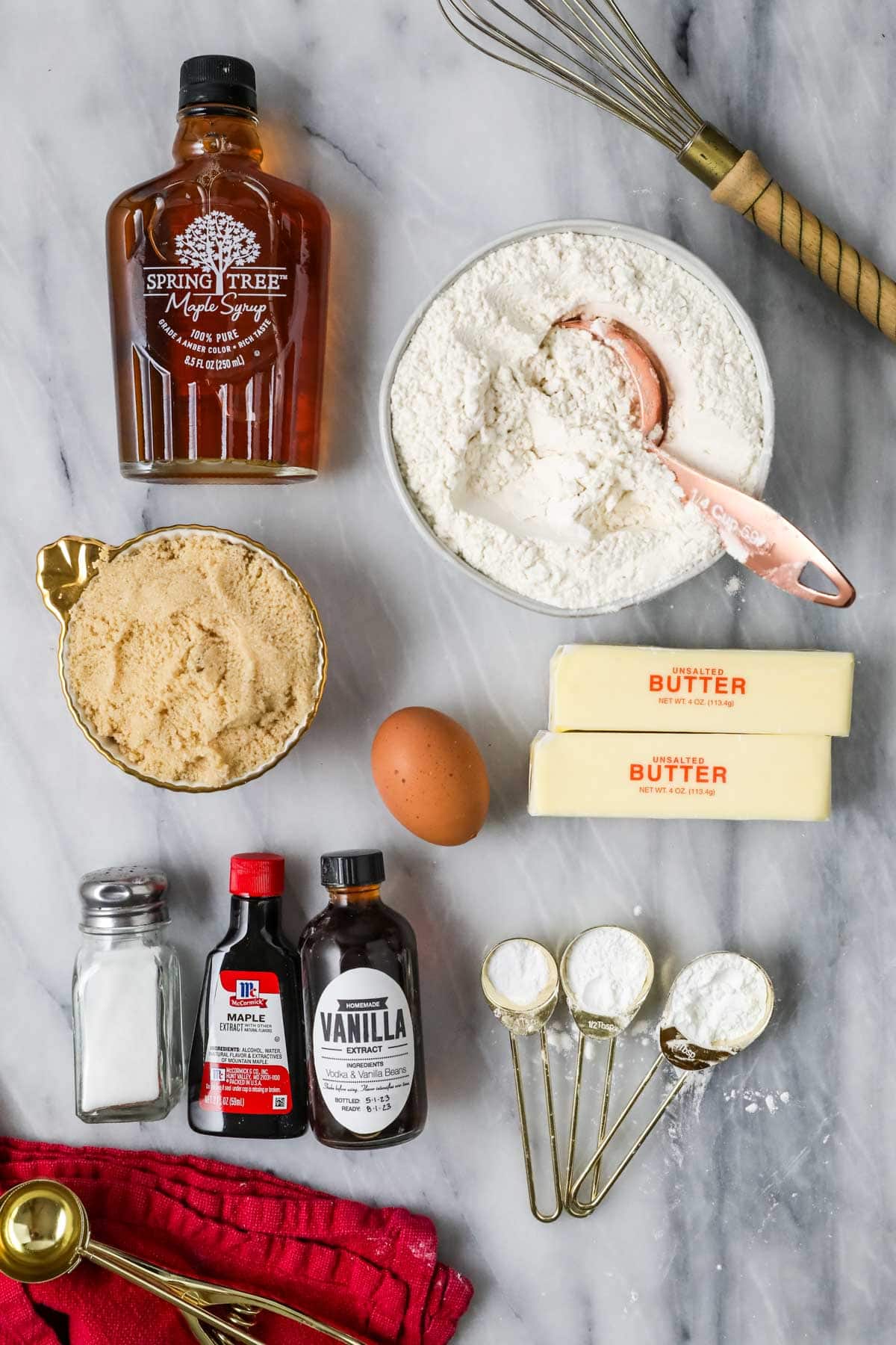 Overhead view of ingredients including maple syrup, brown sugar, flour, and more.