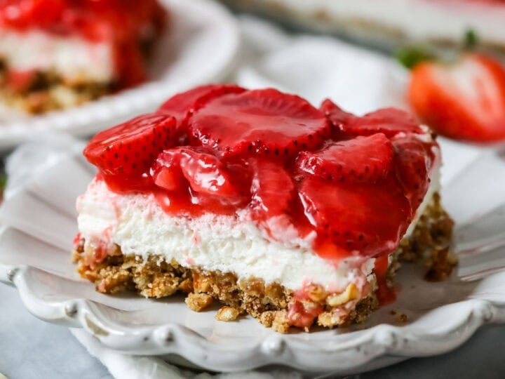 Slice of strawberry pretzel salad made completely from-scratch.