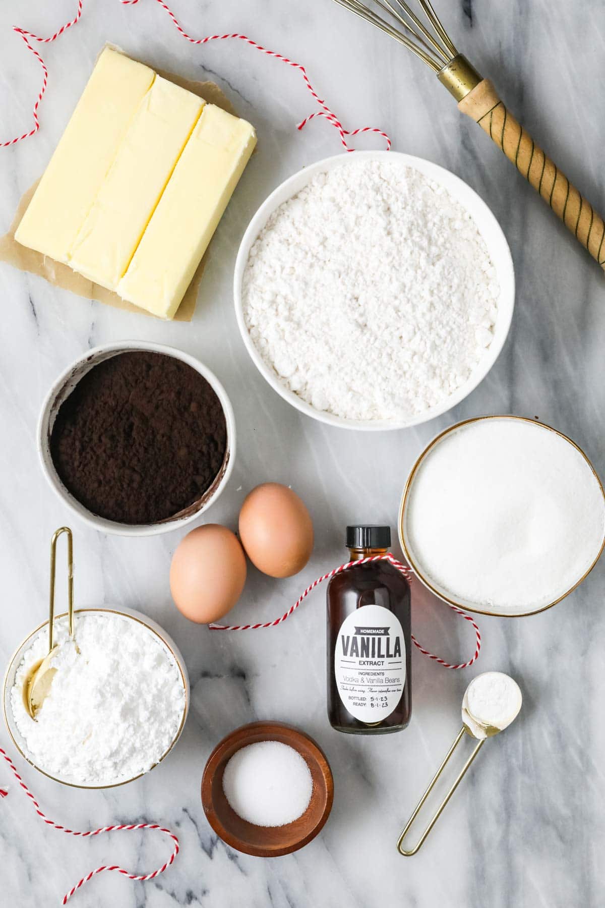 Overhead view of ingredients including black cocoa, butter, sugar, and more.