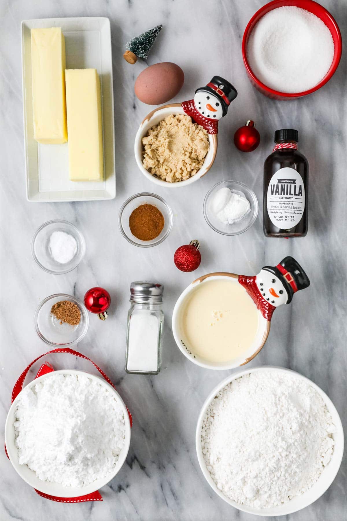 Overhead view of ingredients including eggnog, nutmeg, butter, and more.