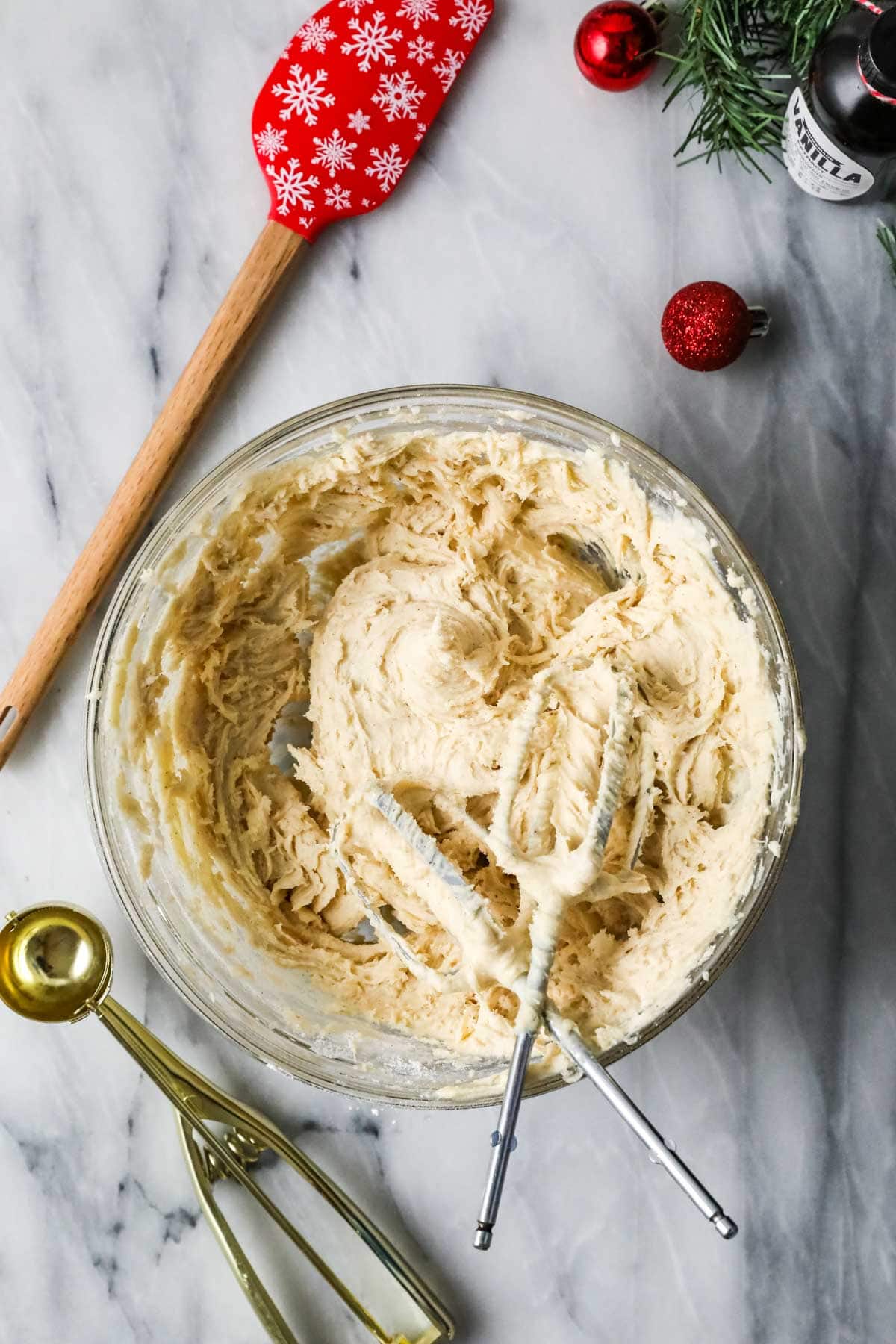 Overhead view of a bowl of cookie dough made with eggnog.