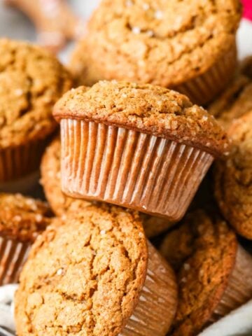 Pile of gingerbread muffins in a bowl.