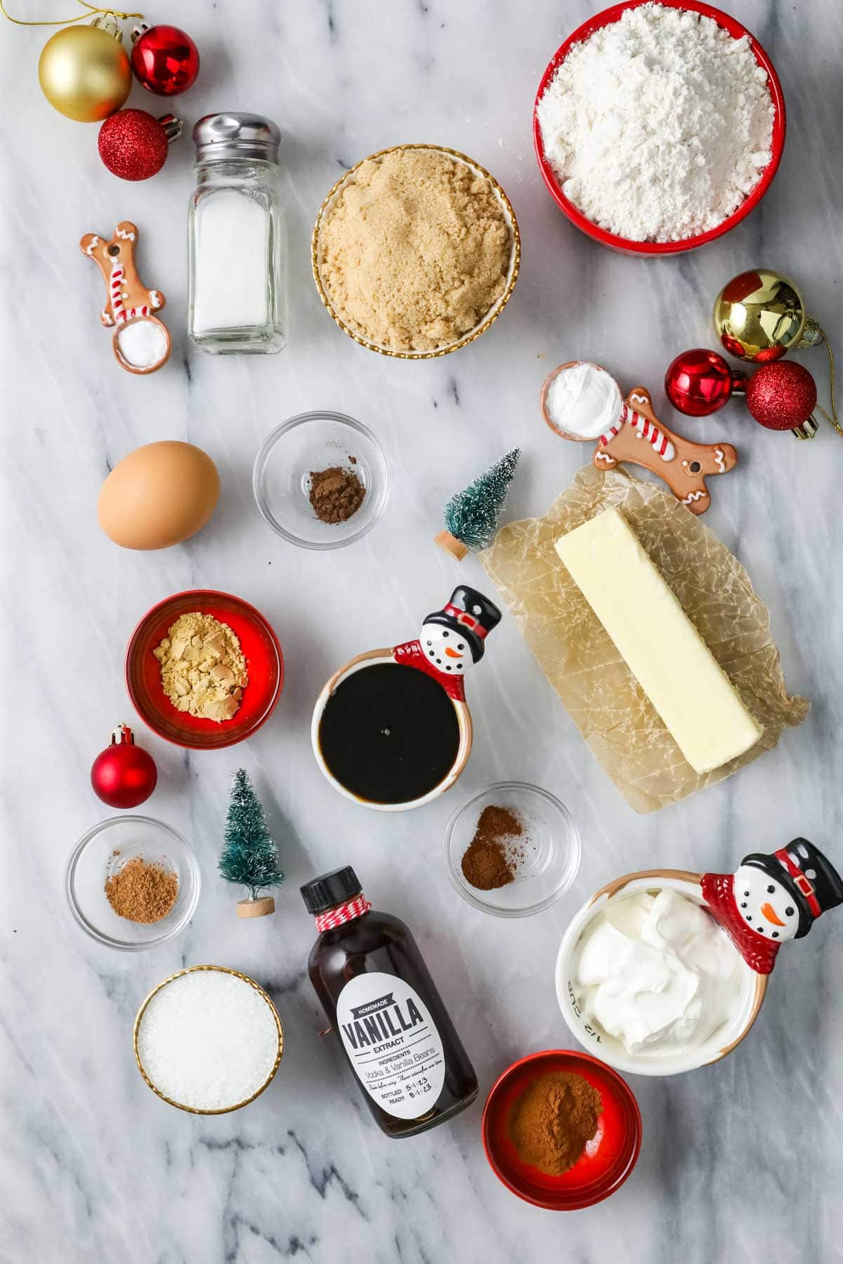 Overhead view of ingredients including spices, brown sugar, molasses, and more.