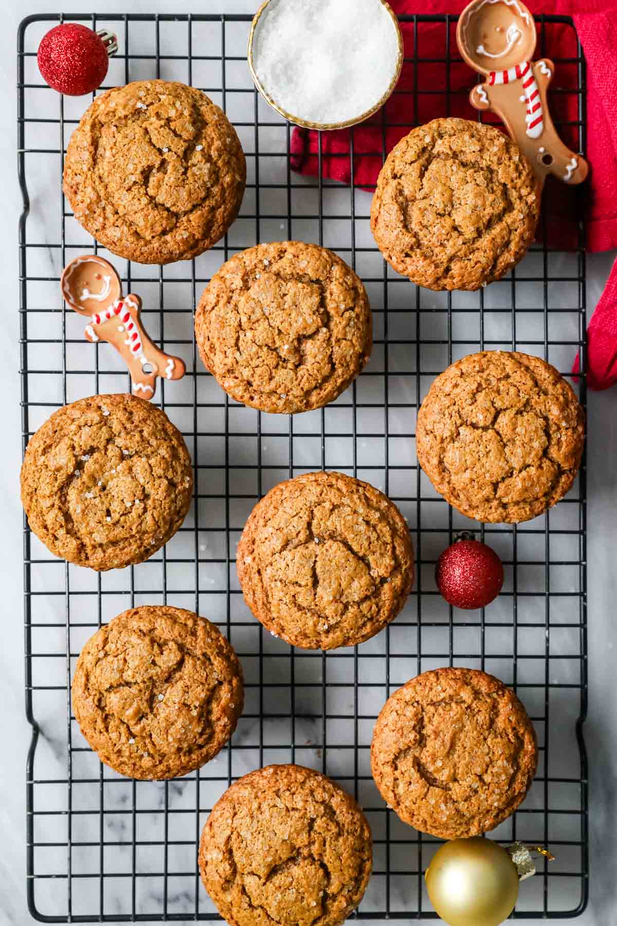 Overhead view of gingerbread muffins on a cooling rack.