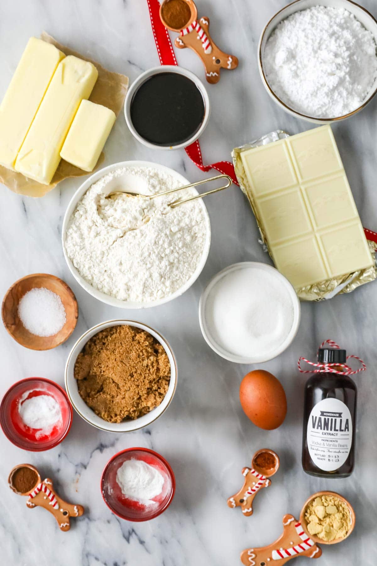 Overhead view of ingredients including molasses, brown sugar, white chocolate, and more.