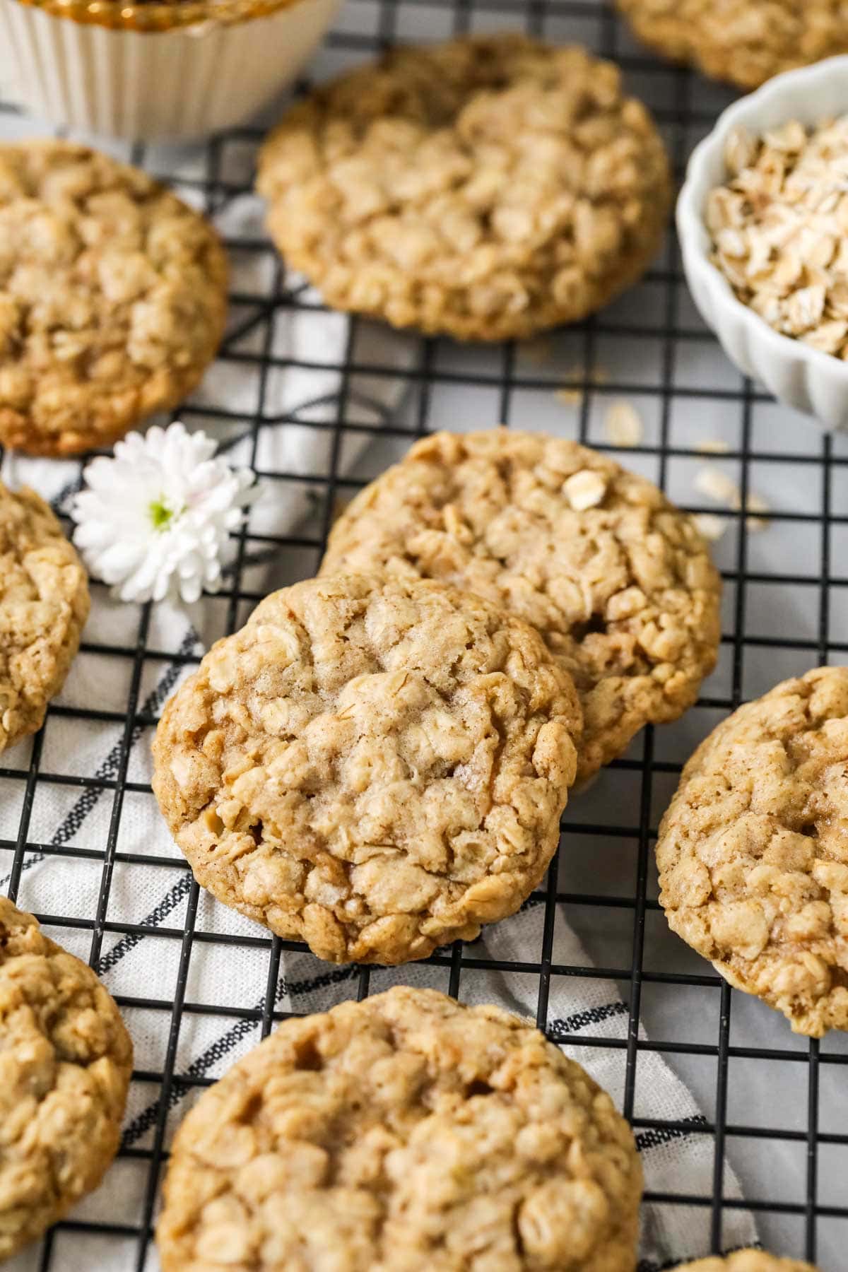 Oatmeal cookies made with sourdough discard on a cooling rack.