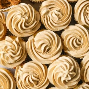 Overhead view of cupcakes frosted with brown sugar swiss meringue buttercream.