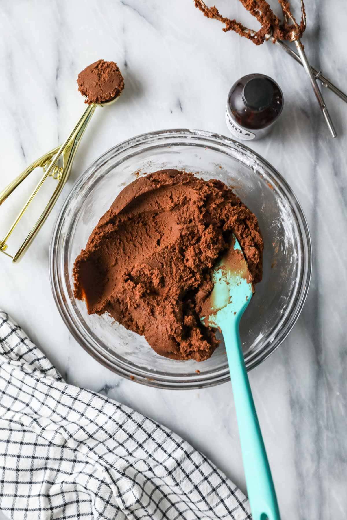 Overhead view of a bowl of chocolate cookie dough.