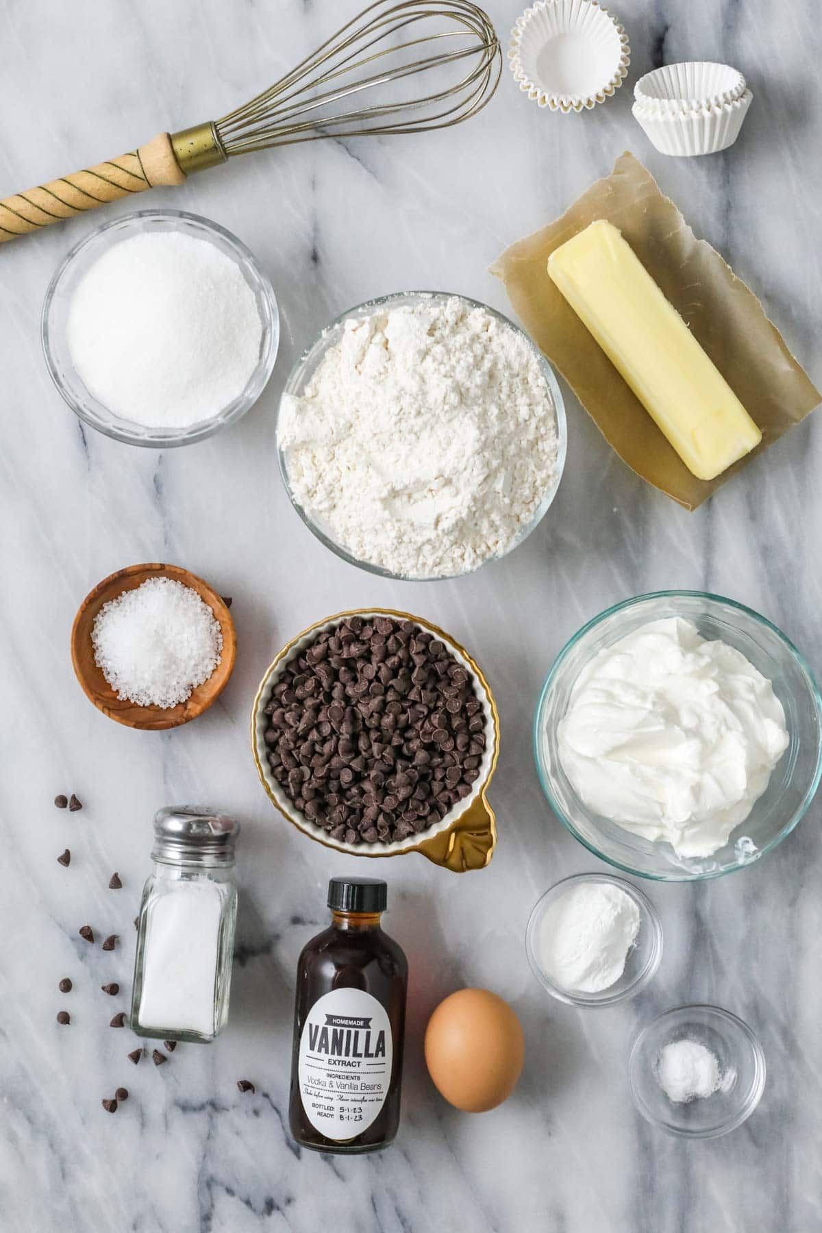 Overhead view of ingredients including mini chocolate chips, flour, butter, and more.