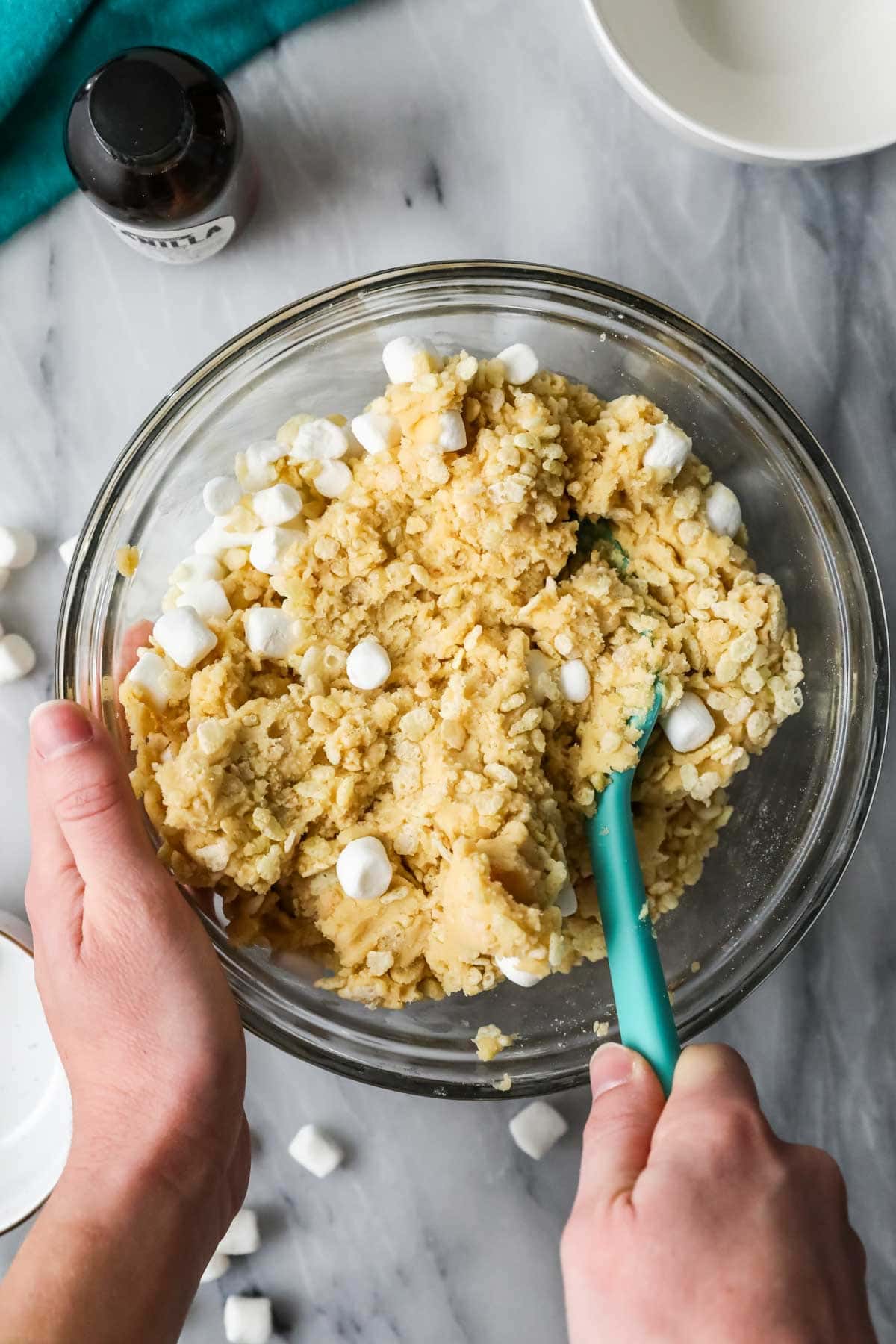 Overhead view of a bowl of cookie dough made with rice krispies cereal and marshmallows.