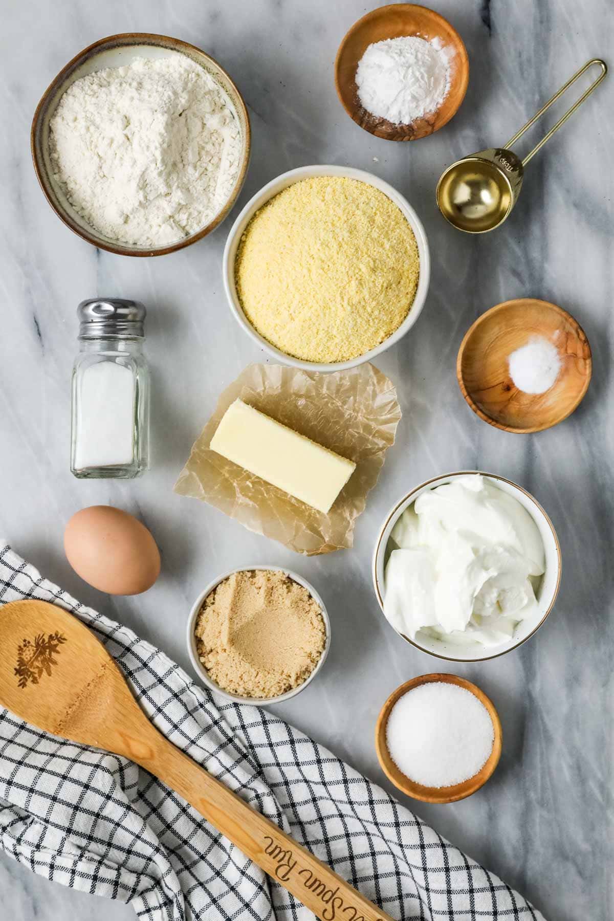 Overhead view of ingredients including cornmeal, butter, sour cream, and more.