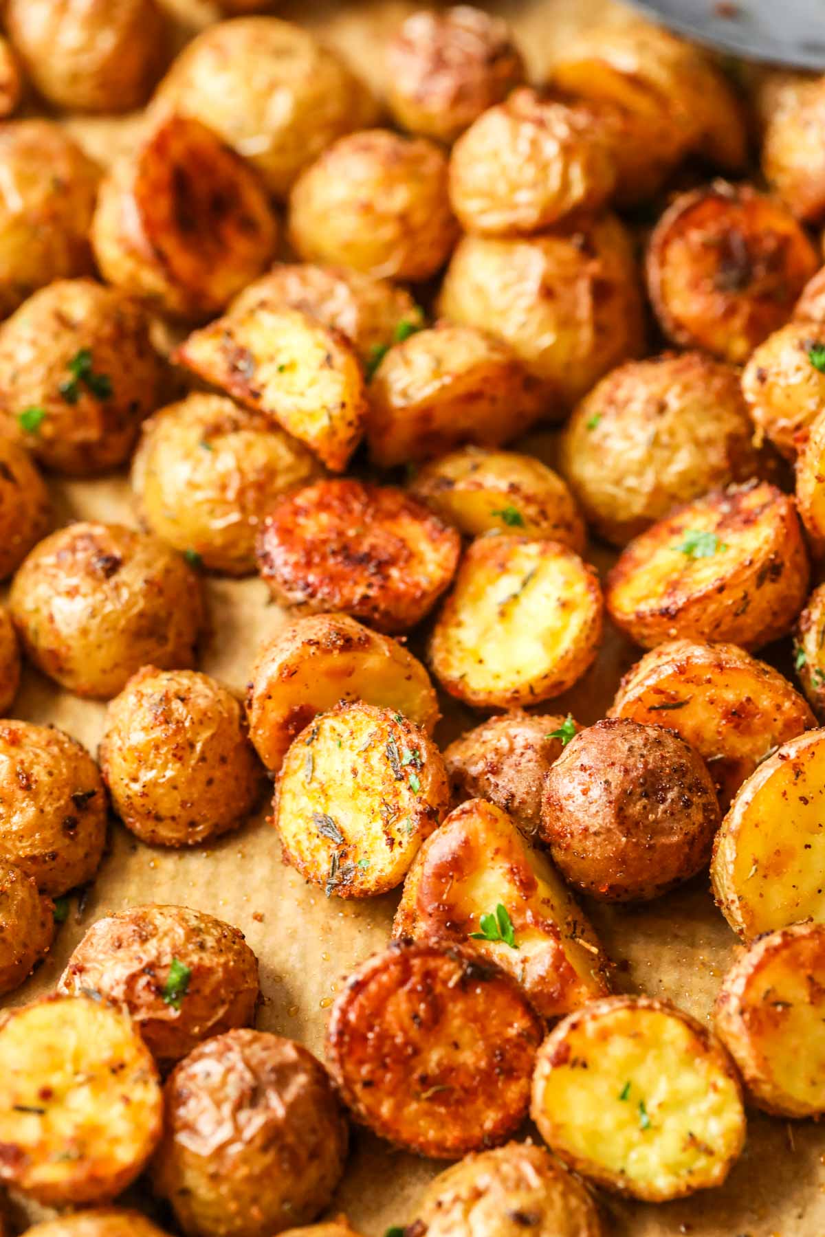 Close-up of baby potatoes after baking in oven.