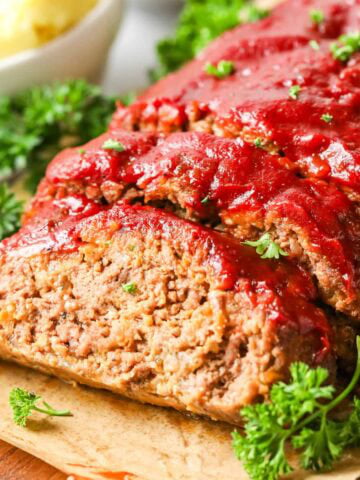 Meatloaf with one slice cut to show the interior.