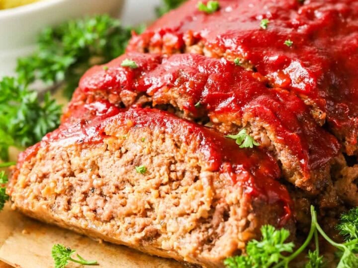 Meatloaf with one slice cut to show the interior.