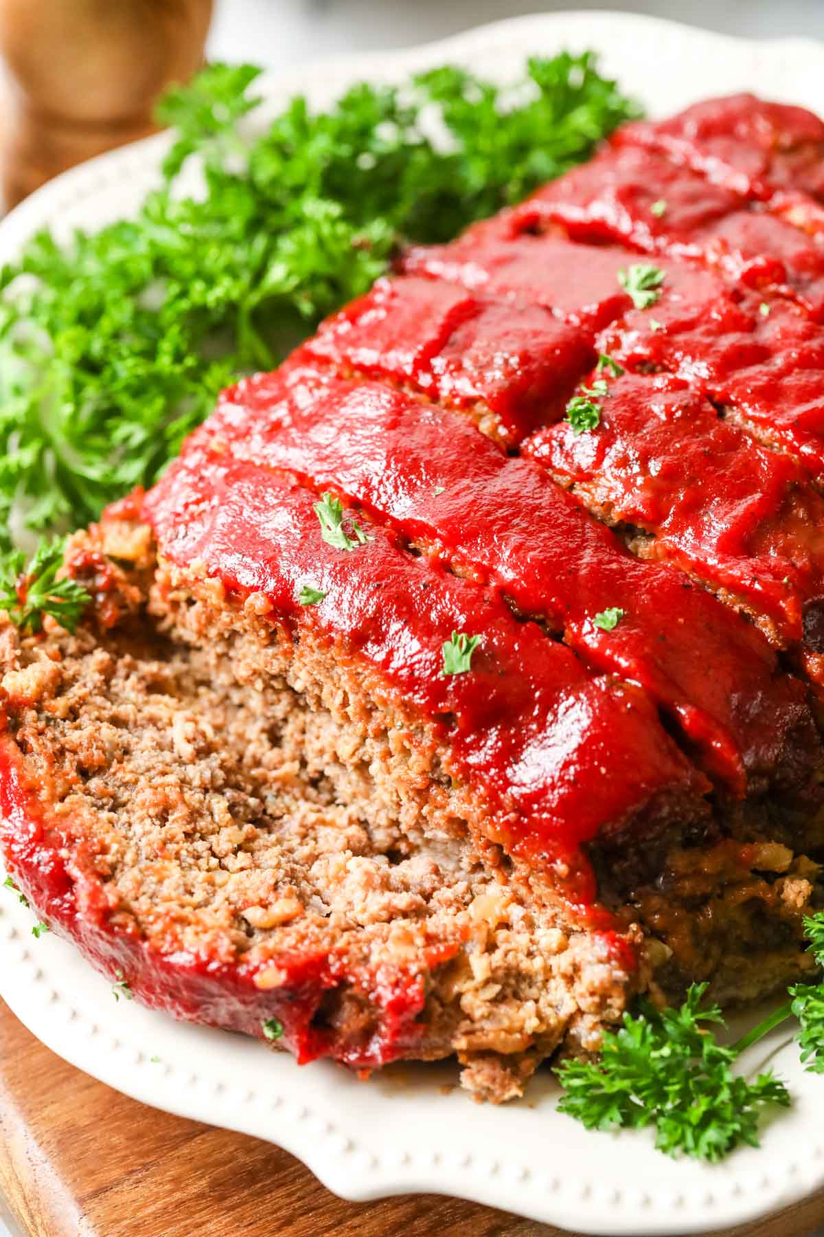 Slices of meatloaf topped with a homemade glaze.