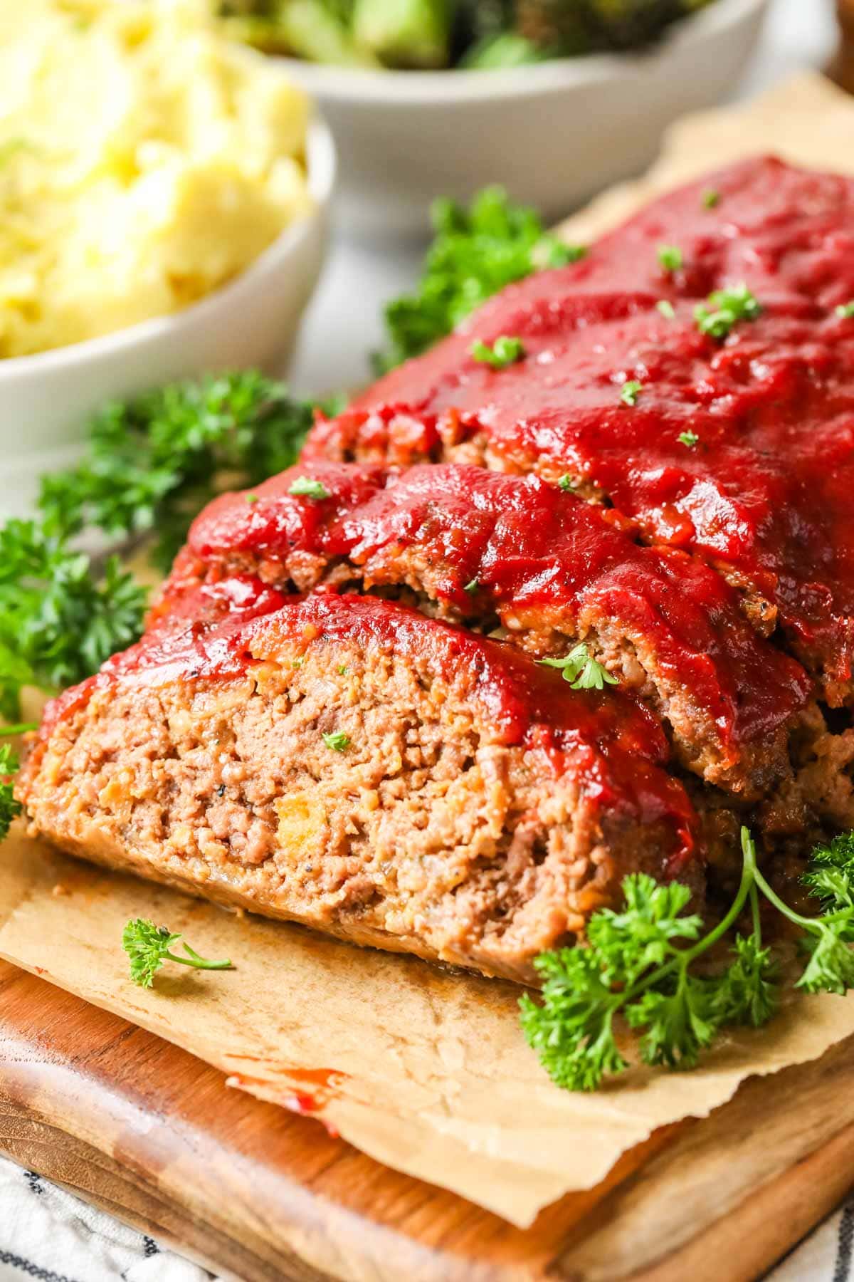 Meatloaf with one slice cut to show the interior.