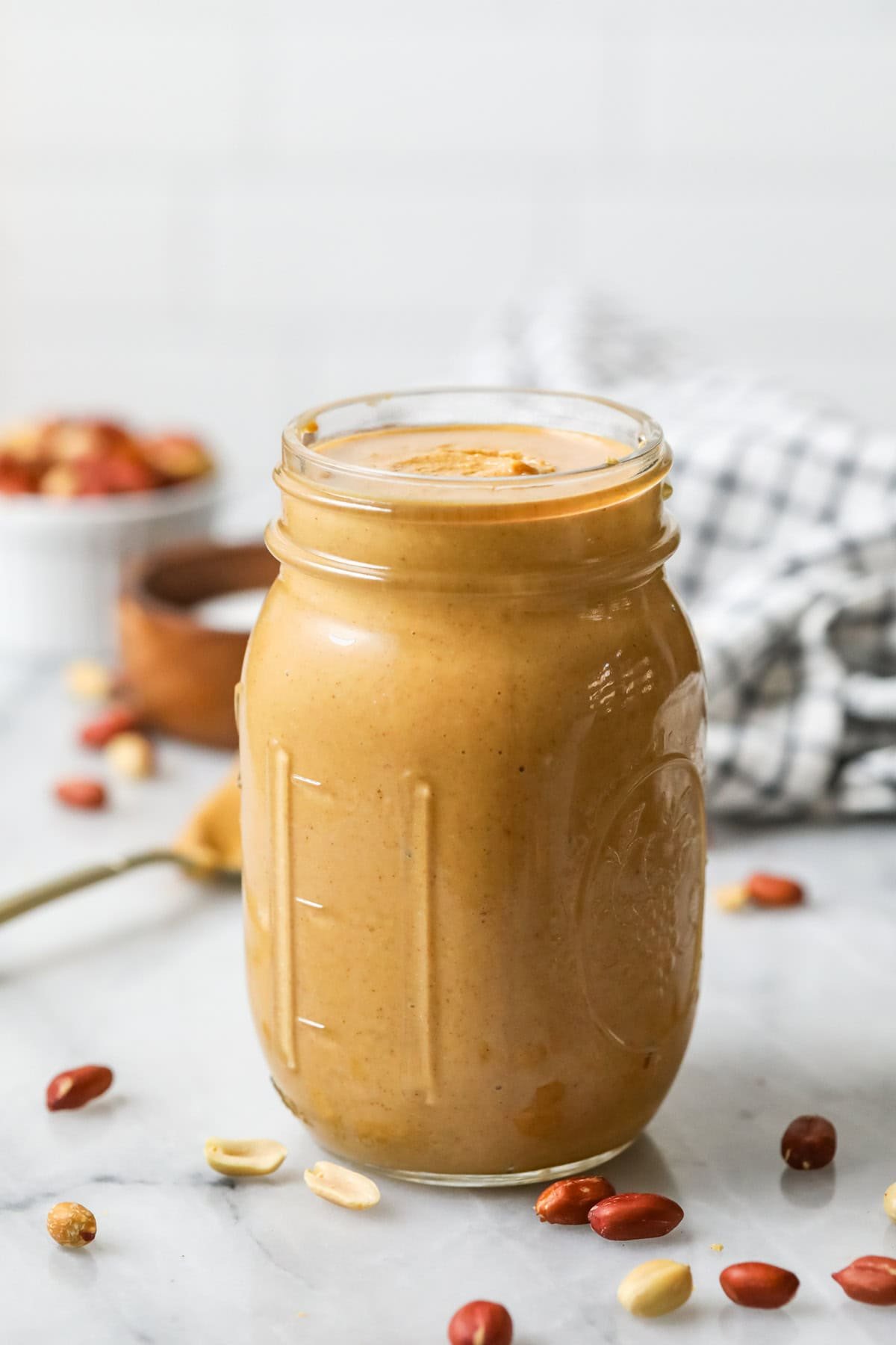 Front view of a can of homemade peanut butter.