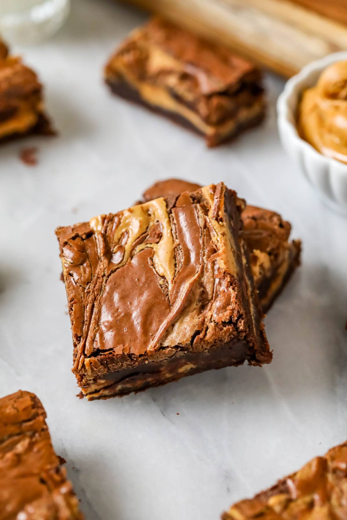 Two peanut butter brownies stacked on top of each other.