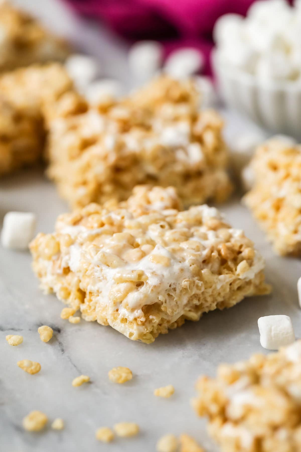 Square cereal bar made with rice krispies and marshmallows.