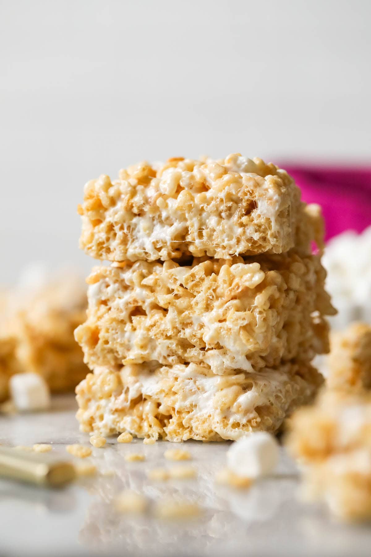 Stack of three homemade rice krispie treats.