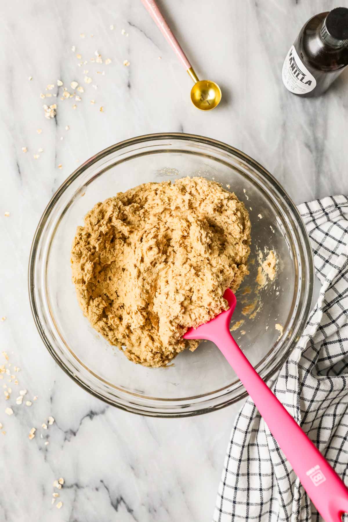 Cookie dough in a glass mixing bowl