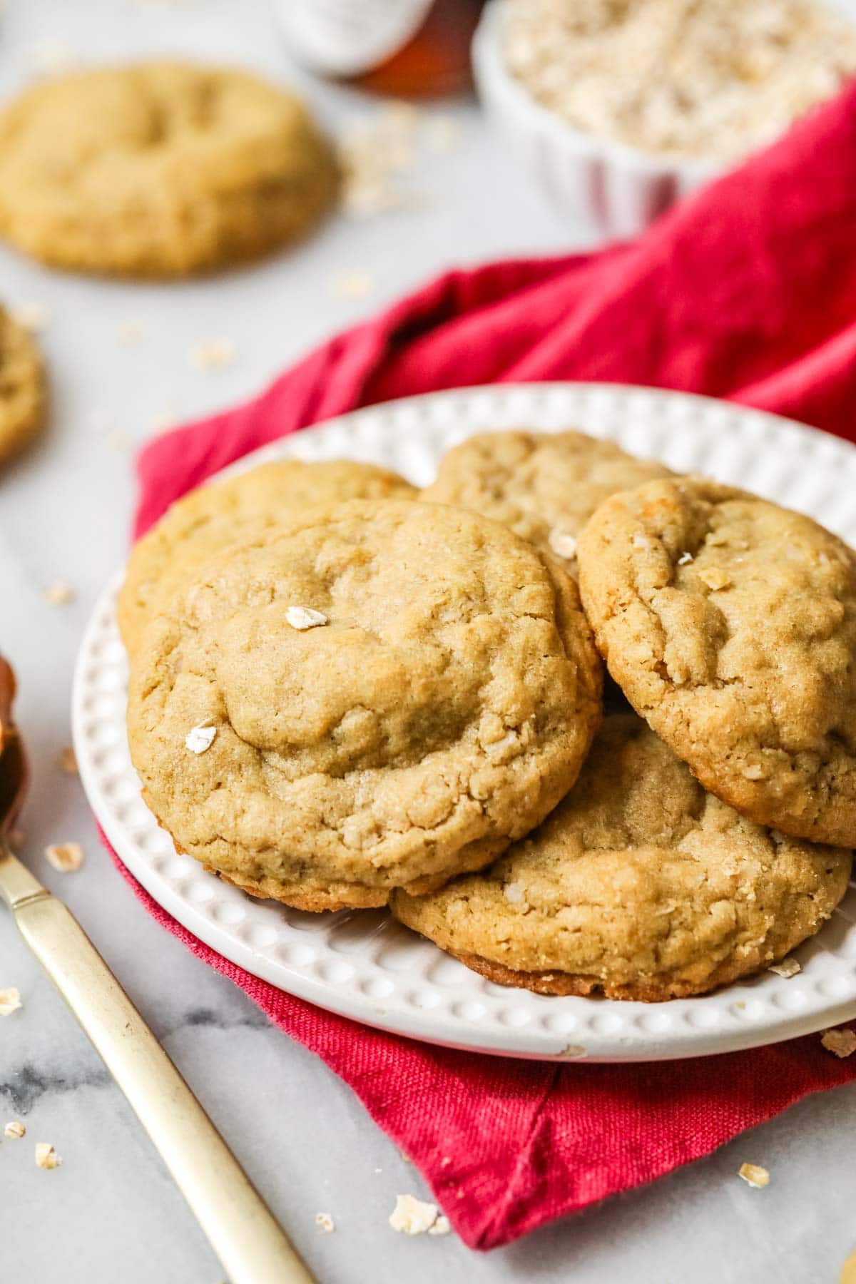 peanut butter cookies with oatmeal on a white plate