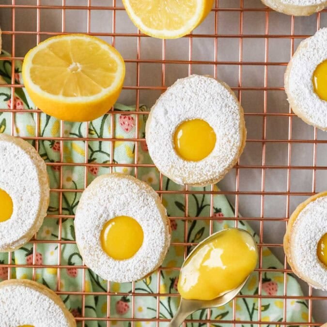 Overhead view of egg cookies made with lemon curd on a cooling rack.