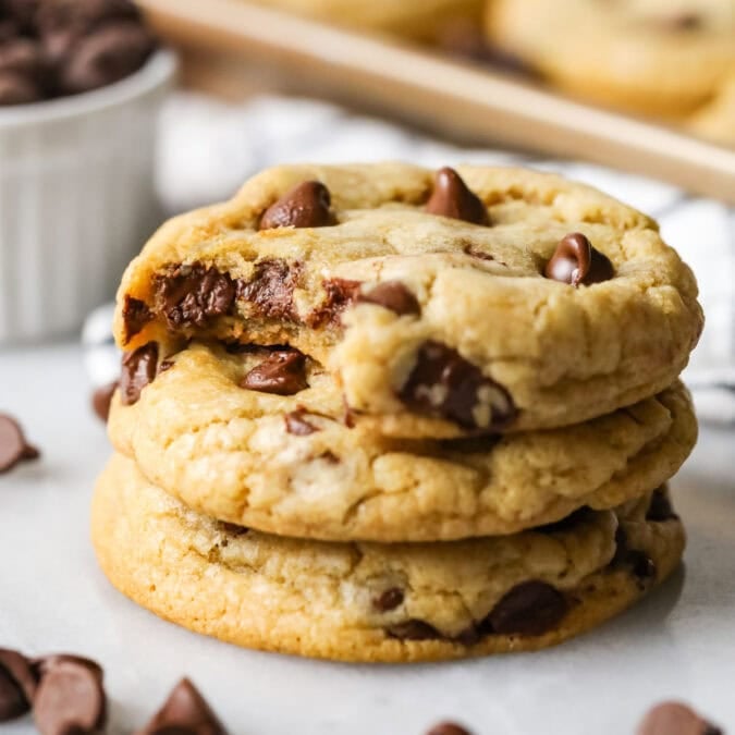Stack of three chocolate chip cookies made from the best chocolate chip cookies recipe.