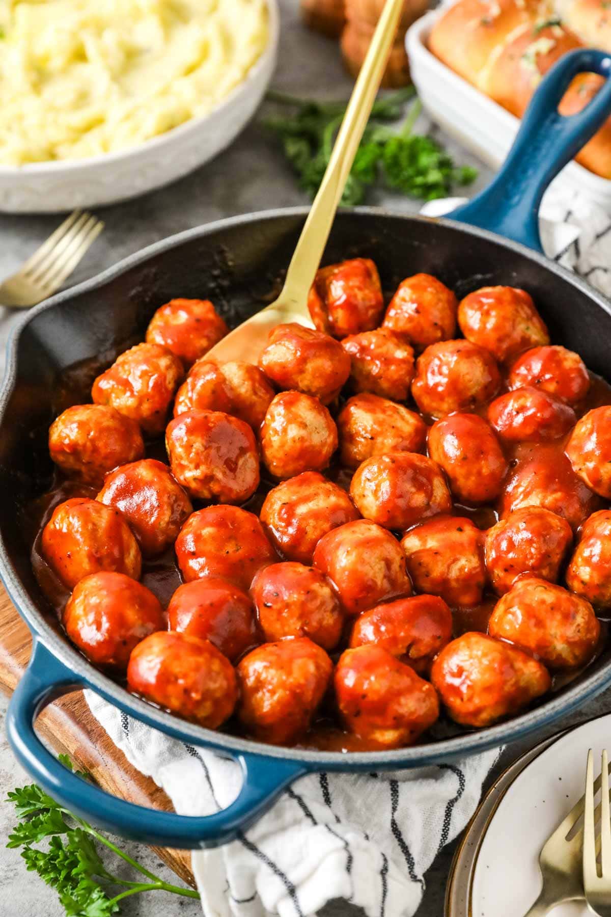 BBQ chicken meatballs in a skillet.