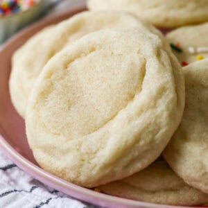 Thick and soft gourmet sugar cookies that have been rolled in sugar before baking.