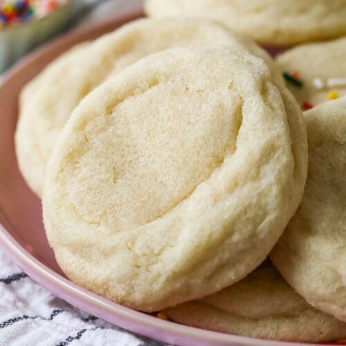 Thick and soft gourmet sugar cookies that have been rolled in sugar before baking.