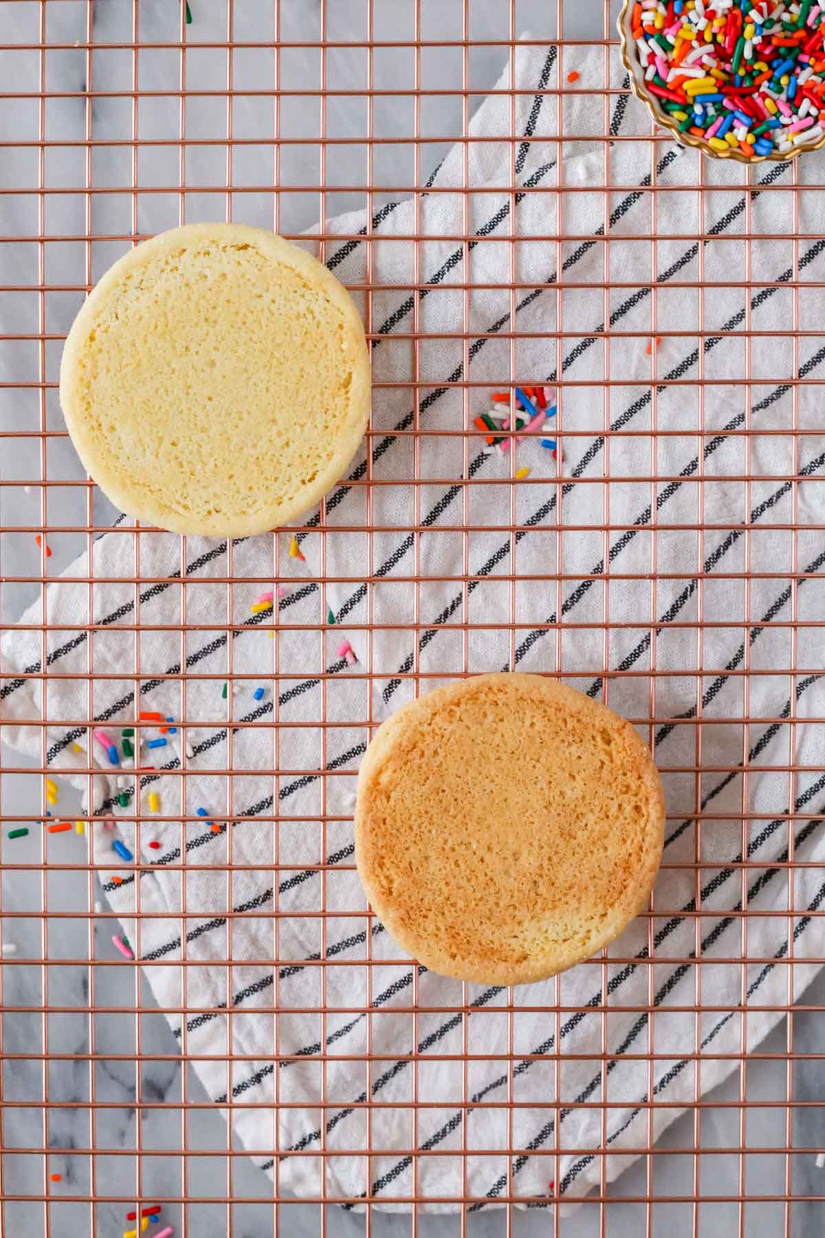 Comparison of the bottoms of a properly baked cookie and an over-baked cookie.