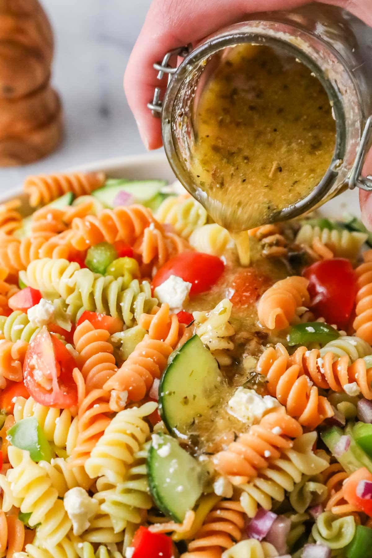 Pour on pasta salad.
