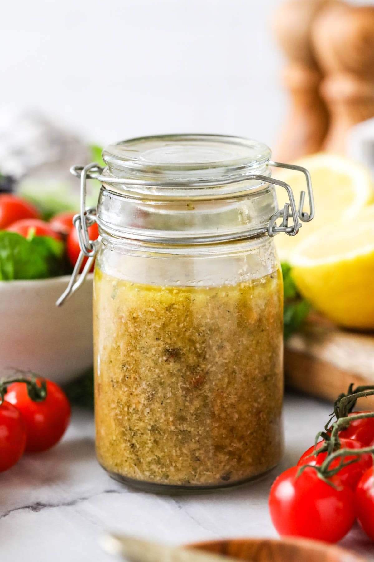 A can of homemade dressing made from oregano, basil, parmesan cheese and more.