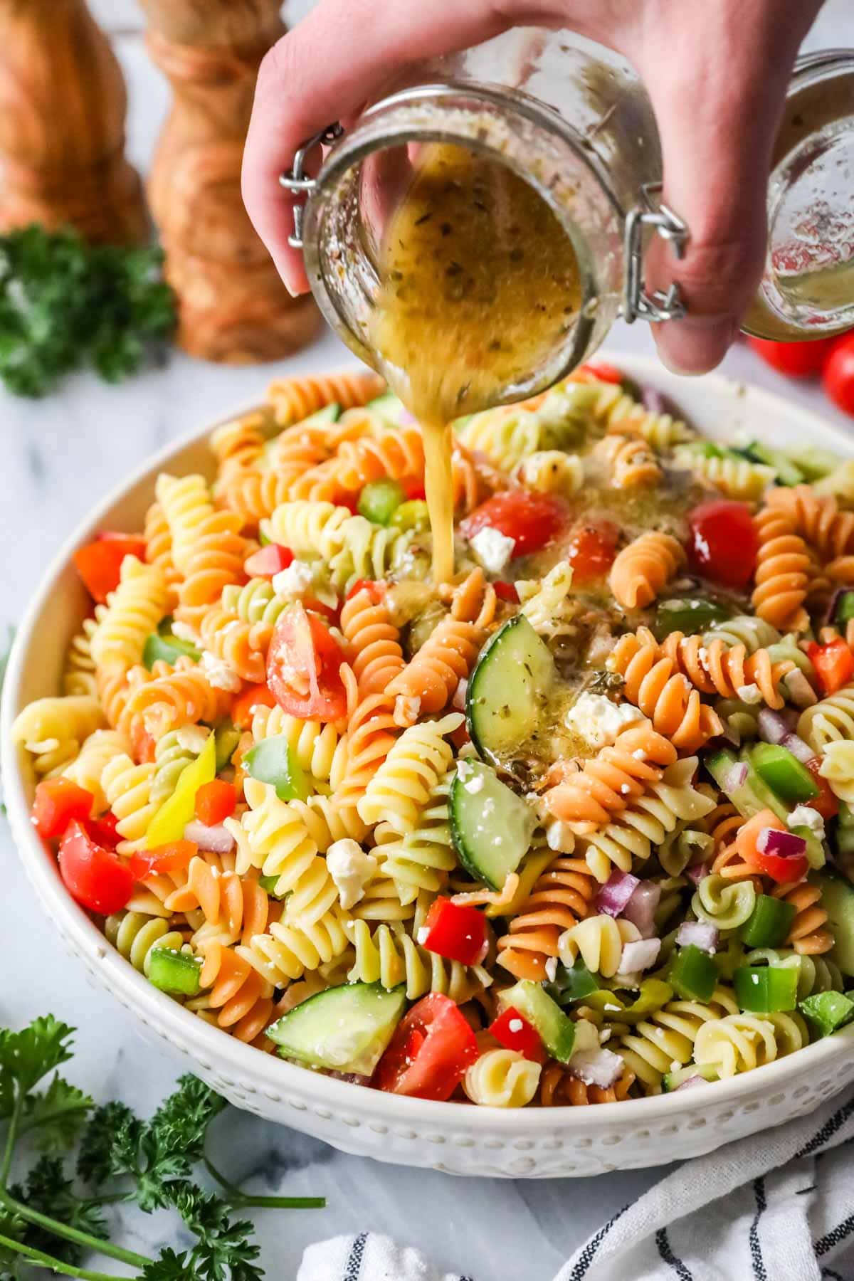 Dressing on pasta salad.
