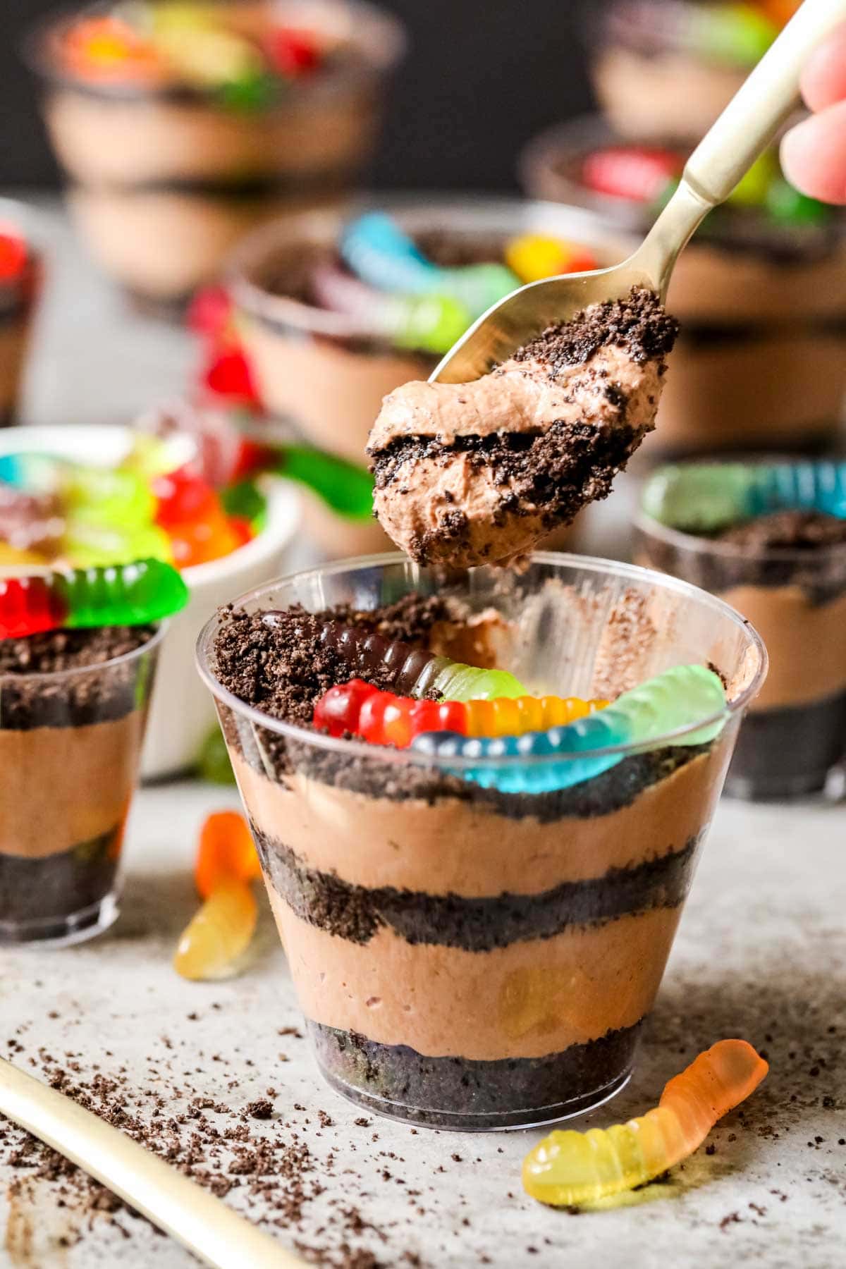 Spoonful being scooped out of a dirt pudding cup.