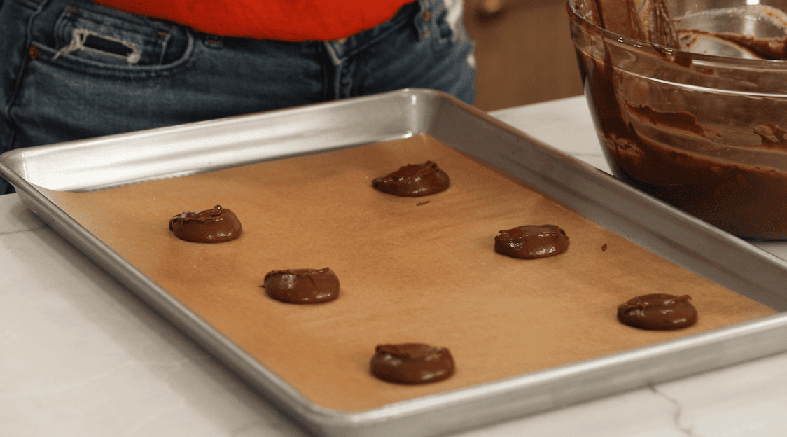 Chocolate cookie batter on a baking sheet before baking.