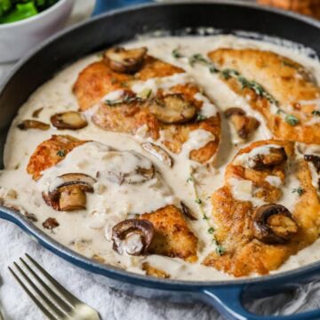 Skillet of creamy mushroom chicken.