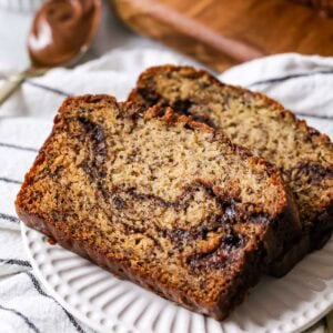 Two slices of nutella banana bread on a plate.
