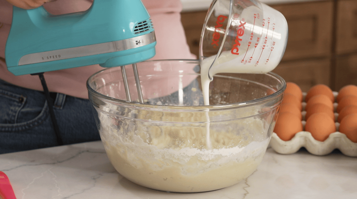 Mixing buttermilk into cake batter.