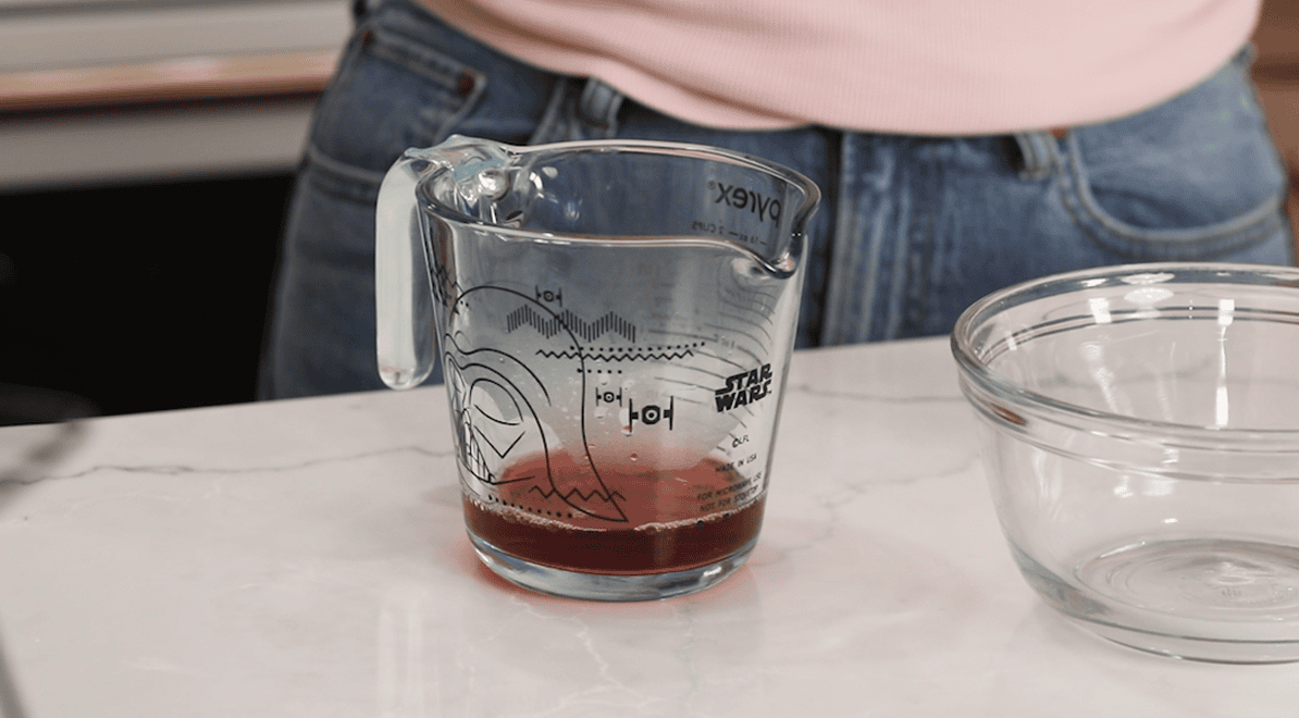 Pink champagne after being reduced on the stove until very dark in color.