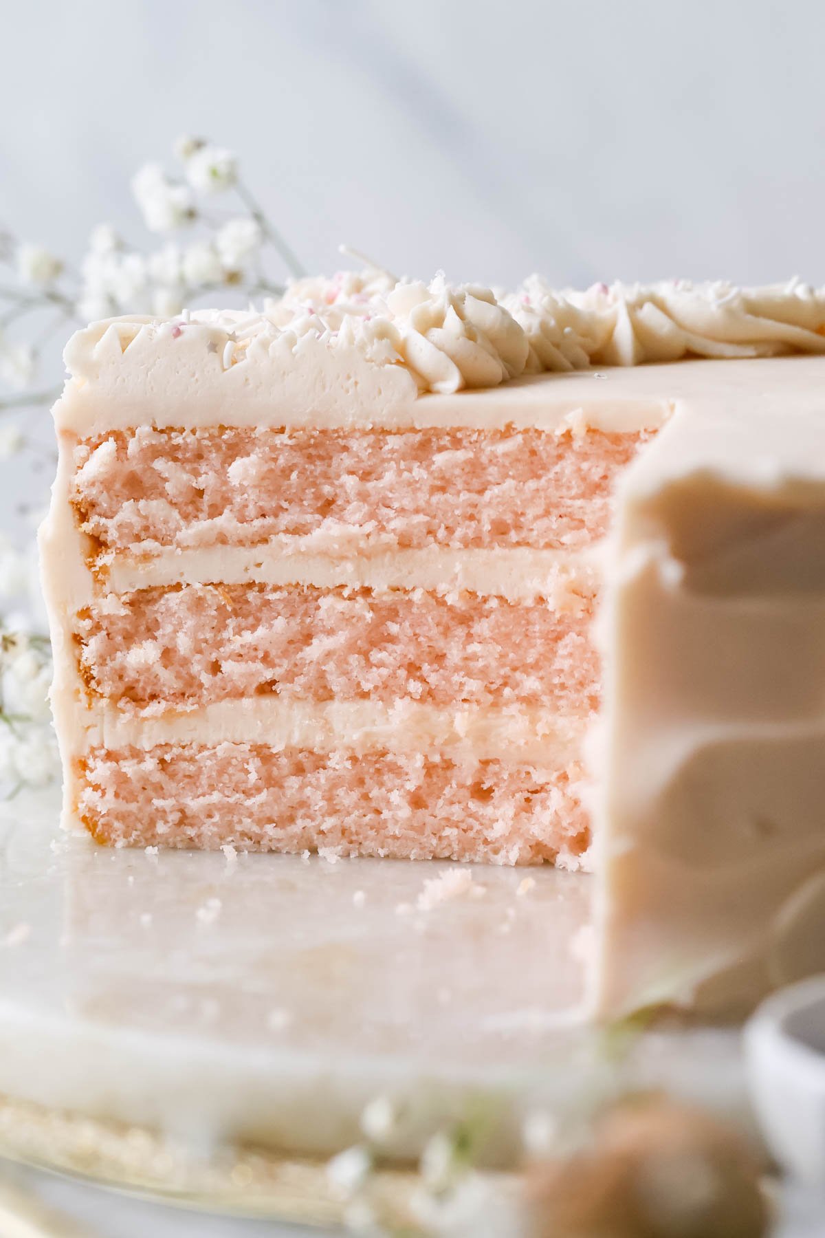 Cross section of a three layer pink champagne cake.