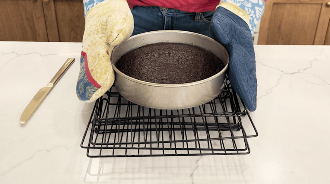 Chocolate cake in a pan after being removed from the oven.