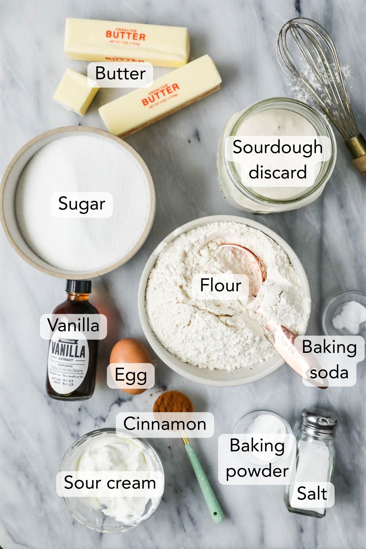 Overhead view of the ingredients for sourdough coffee cake on marble.
