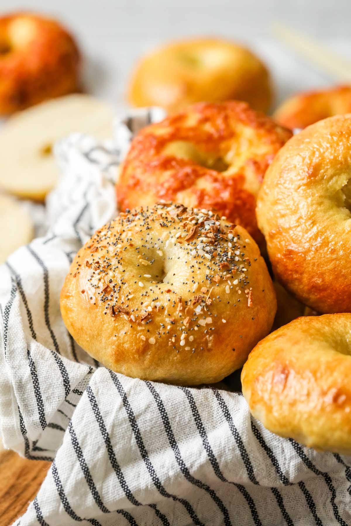 Close-up view of an everything seasoned sourdough bagel.